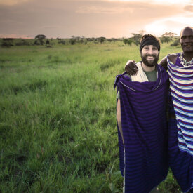 <span>Tanzania:</span> Great Migration Safari 42 Our founder, Jared, embracing cross-cultural connections with the Maasai.