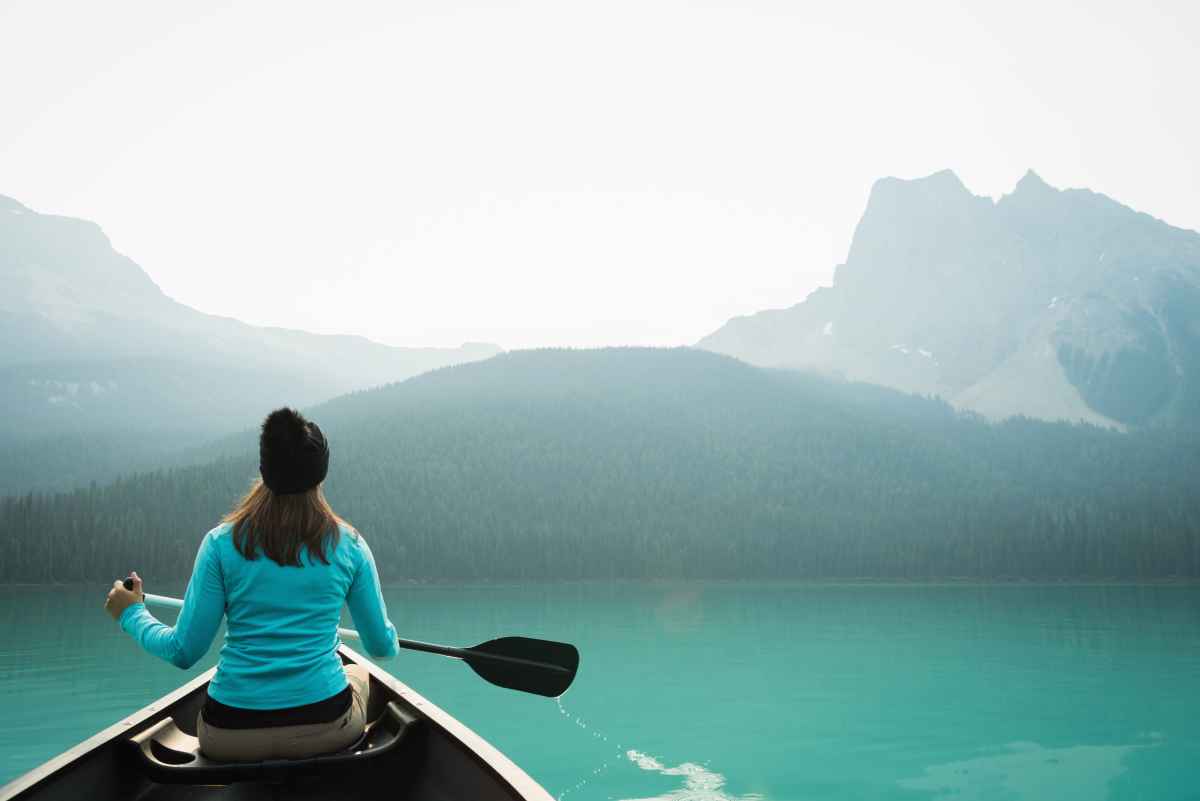 Woman kayaking in the Kenai Fjords