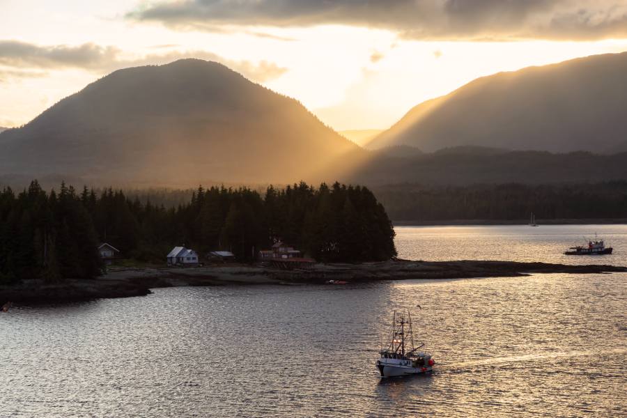 boats traveling on water in Alaska