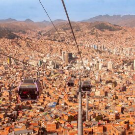 La Paz, Bolivia, stands at 11,975 feet, making it the world’s highest capital—start exploring with a cable car ride offering panoramic views.