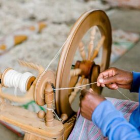 Visit a yarn production facility at the base of Sabyinyo Volcano and learn more about this traditional process of spinning and dyeing.