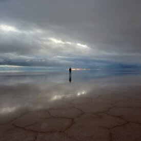 Explore the surreal beauty of Bolivia’s Uyuni Salt Flats, where the sky and earth become one.