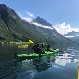 Kayaking the amazing Hjørundfjord is a highlight on this trip