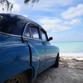 Where else can you find classic cars parked on uncrowded white sand beaches in the Caribbean?!