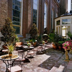 Soak in some sunshine in the beautiful courtyard of Hotel Peter and Paul, one of our alternating accommodations for this tour.