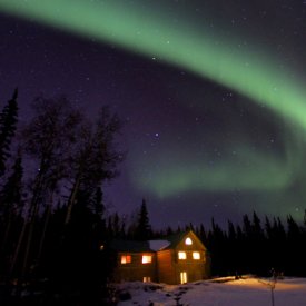 Northern Lights Shine Over A Taste of Alaska Lodge