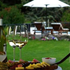Unwind by the pool with a glass of Argentinian wine.