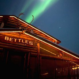 The historic Bettles Lodge with Aurora