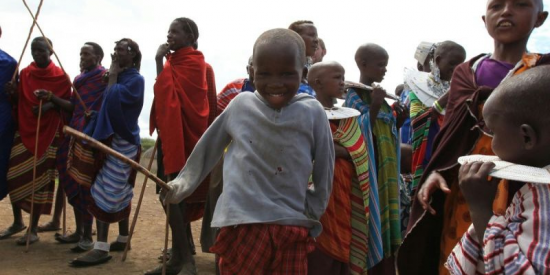 A Massai child joining in the fun